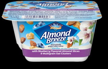 Almond Breeze Vanilla almondmilk yogurt alternative with blueberry flavored almond slices and multigrain oat clusters in a small plastic cup.