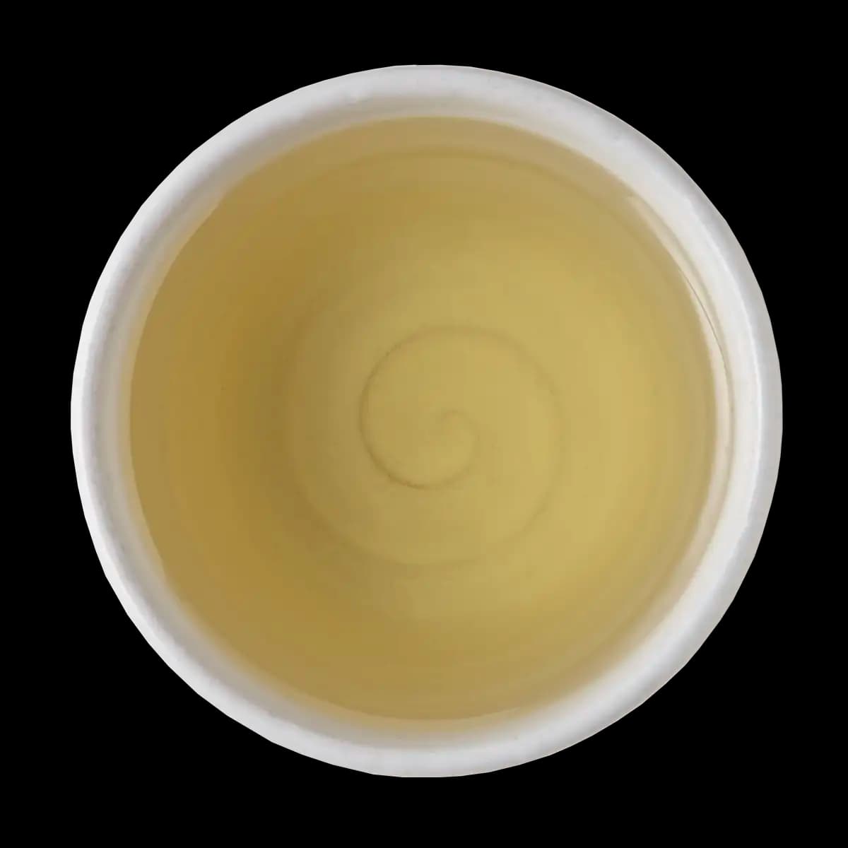 Top view of a white cup filled with light yellow liquid, showing a visible swirl pattern in the center, on a black background.