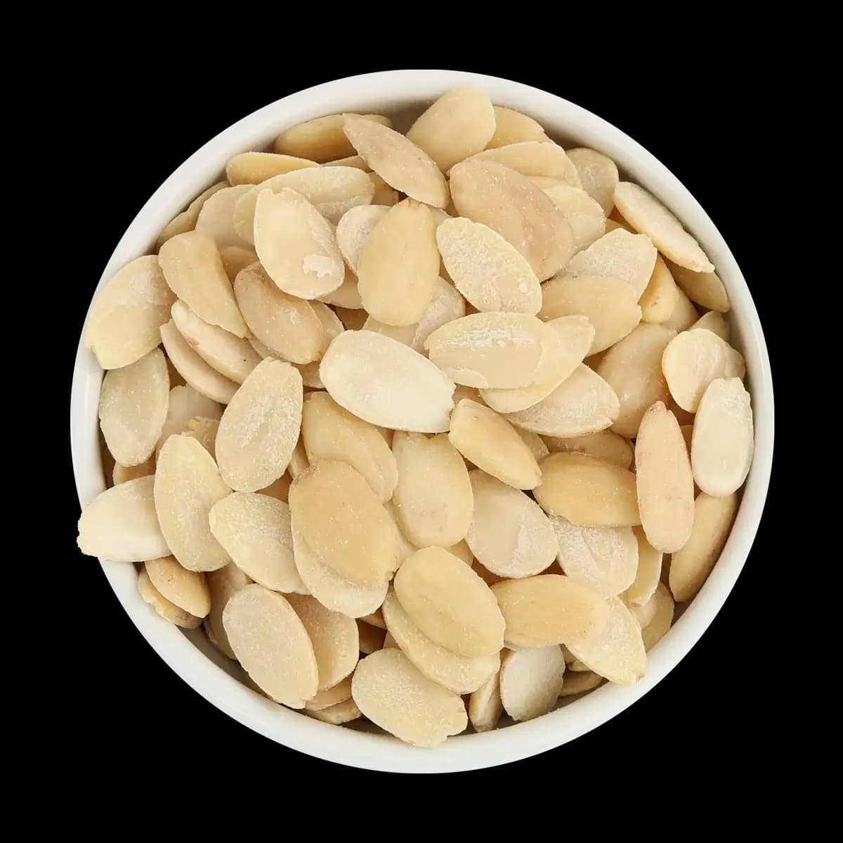 A white bowl filled with peeled, sliced almonds against a solid black background.