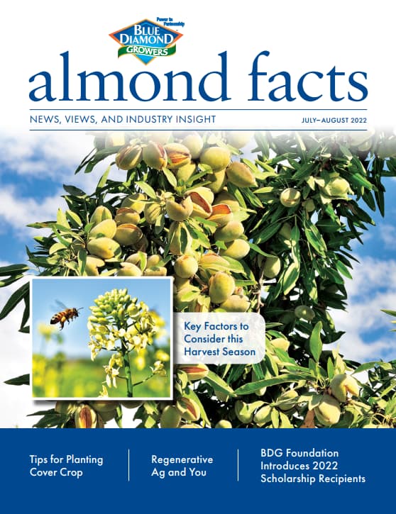 Cover of Almond Facts magazine showing almond tree branches with nuts, a bee on a flower, and article teasers about cover crops, regenerative agriculture, and scholarship recipients.