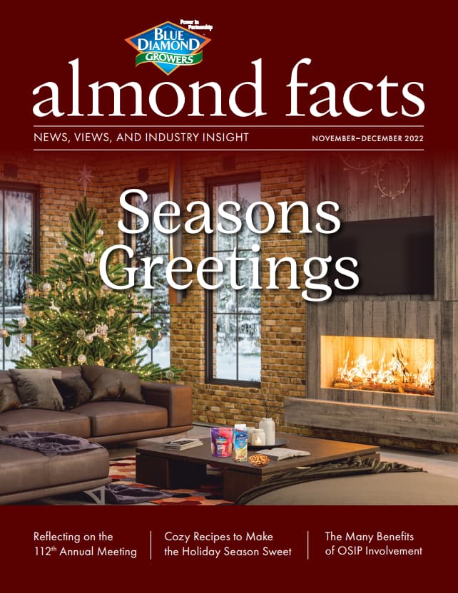 A decorated living room with a lit fireplace, Christmas tree, and almond snacks on a table; the text reads Seasons Greetings and almond facts magazine cover.